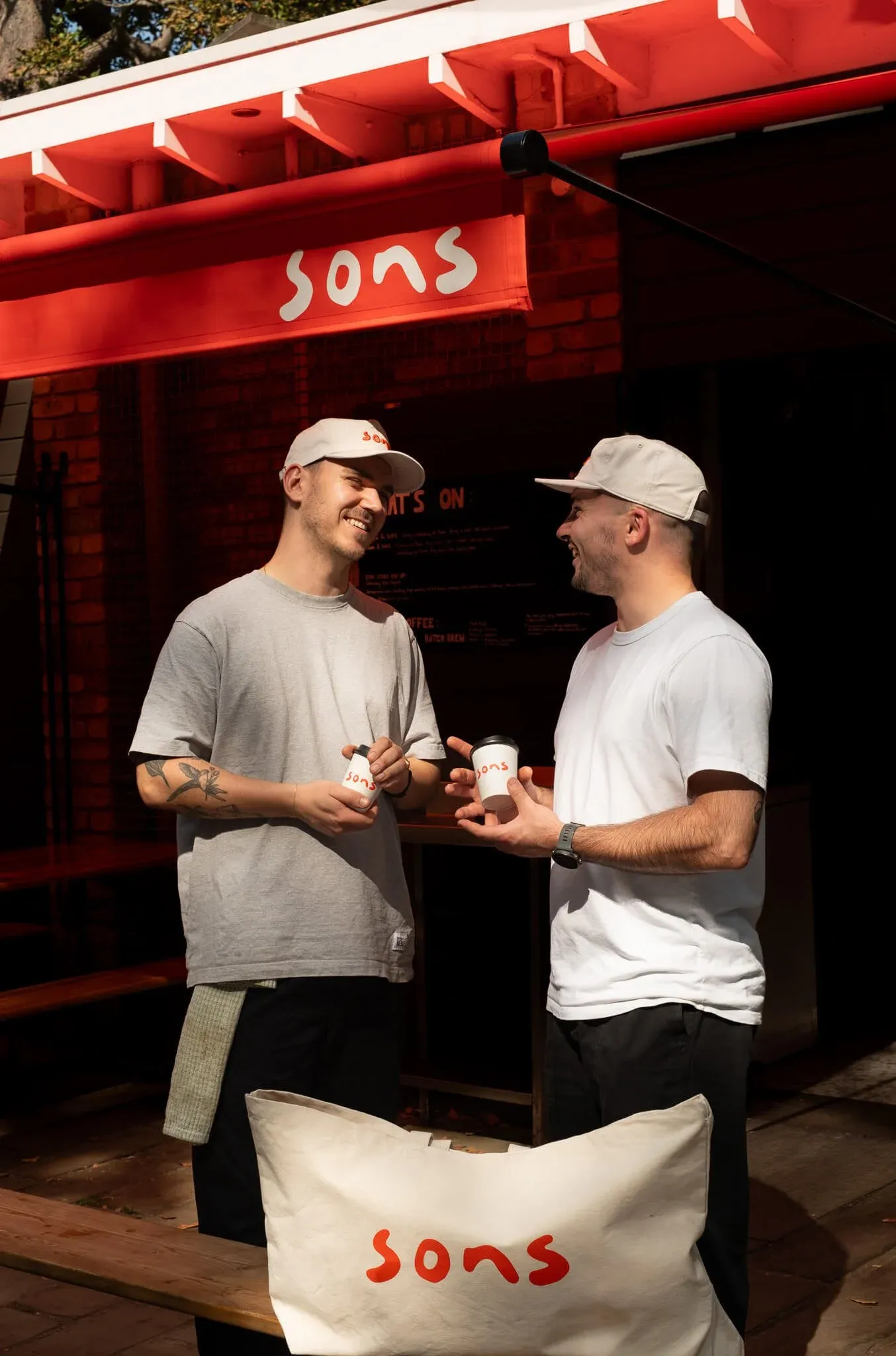 Ben and Barney, the founders of sons, outside the kiosk